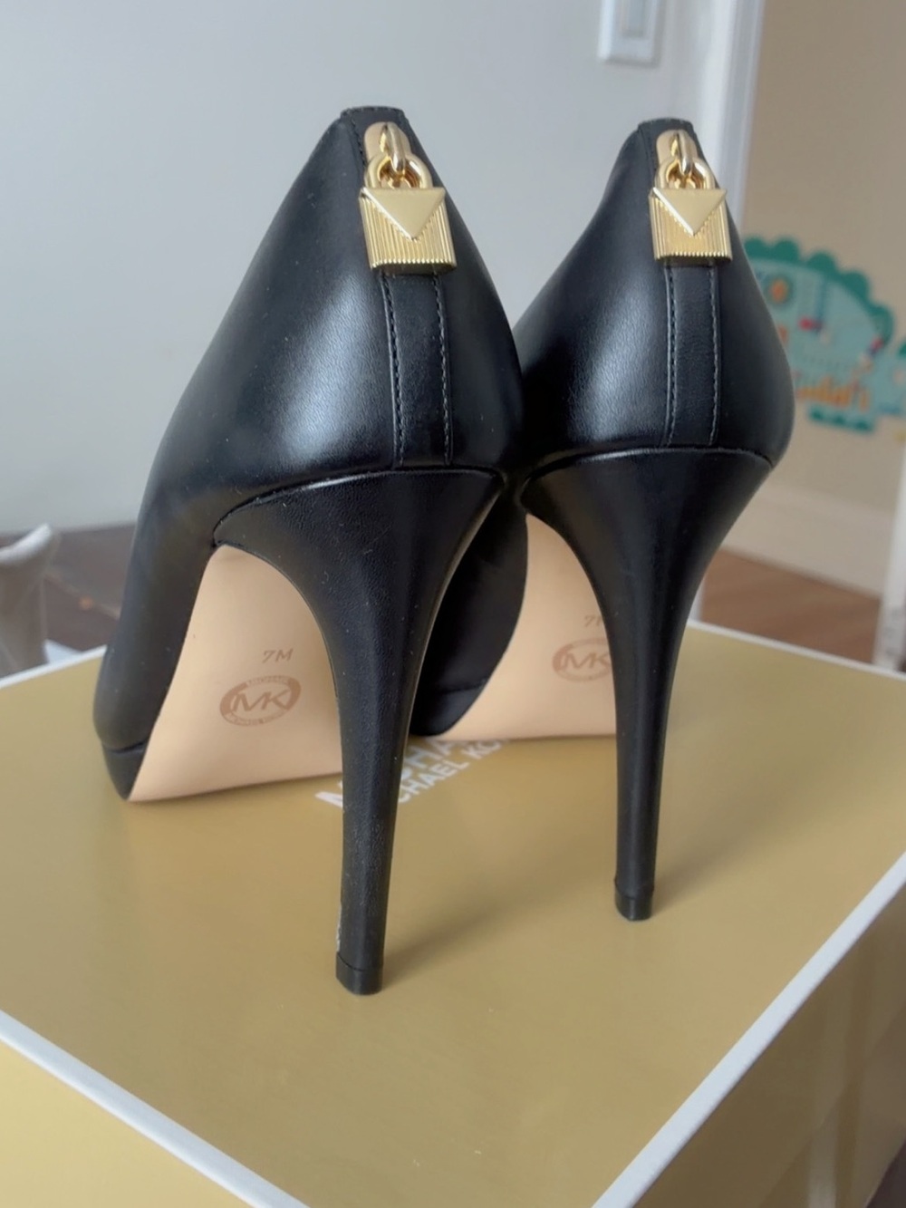 Michael Kors Black Leather Stiletto Pumps with Gold Accent Hardware